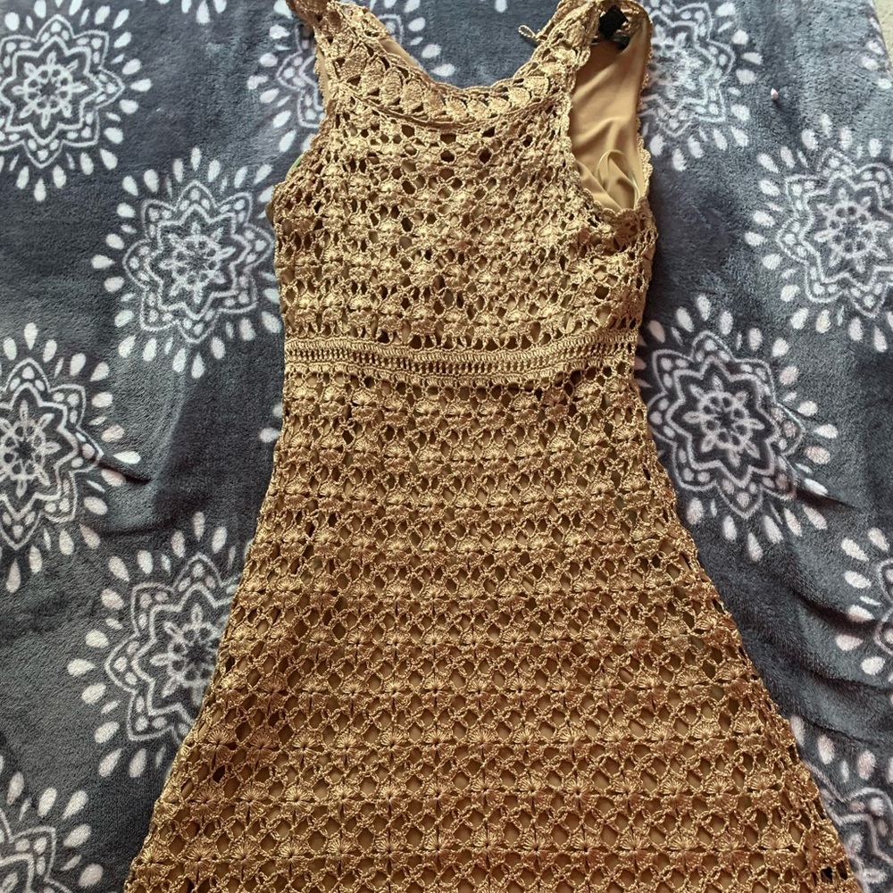 A fancy dress, Size ( Medium) , Color ( Gold)